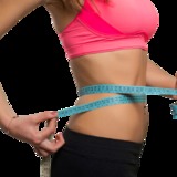 181-1817029_slim-young-woman-measuring-her-thin-waist-with